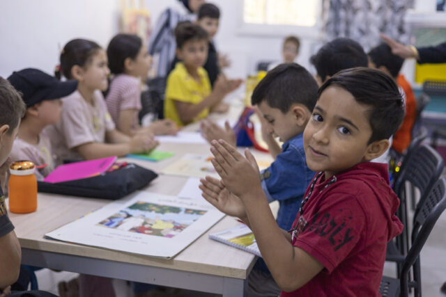 Children working in classrom